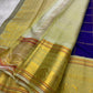 Parimala – Deep Purple Zari Kattam Kanchipuram Pure Silk Saree
Rich purple body with checks and mayil–kamalam buttas
Cardamom green border with red accents and ornate zari paisleys
Pallu with intricate trellis and paisley motifs in shimmering Zari