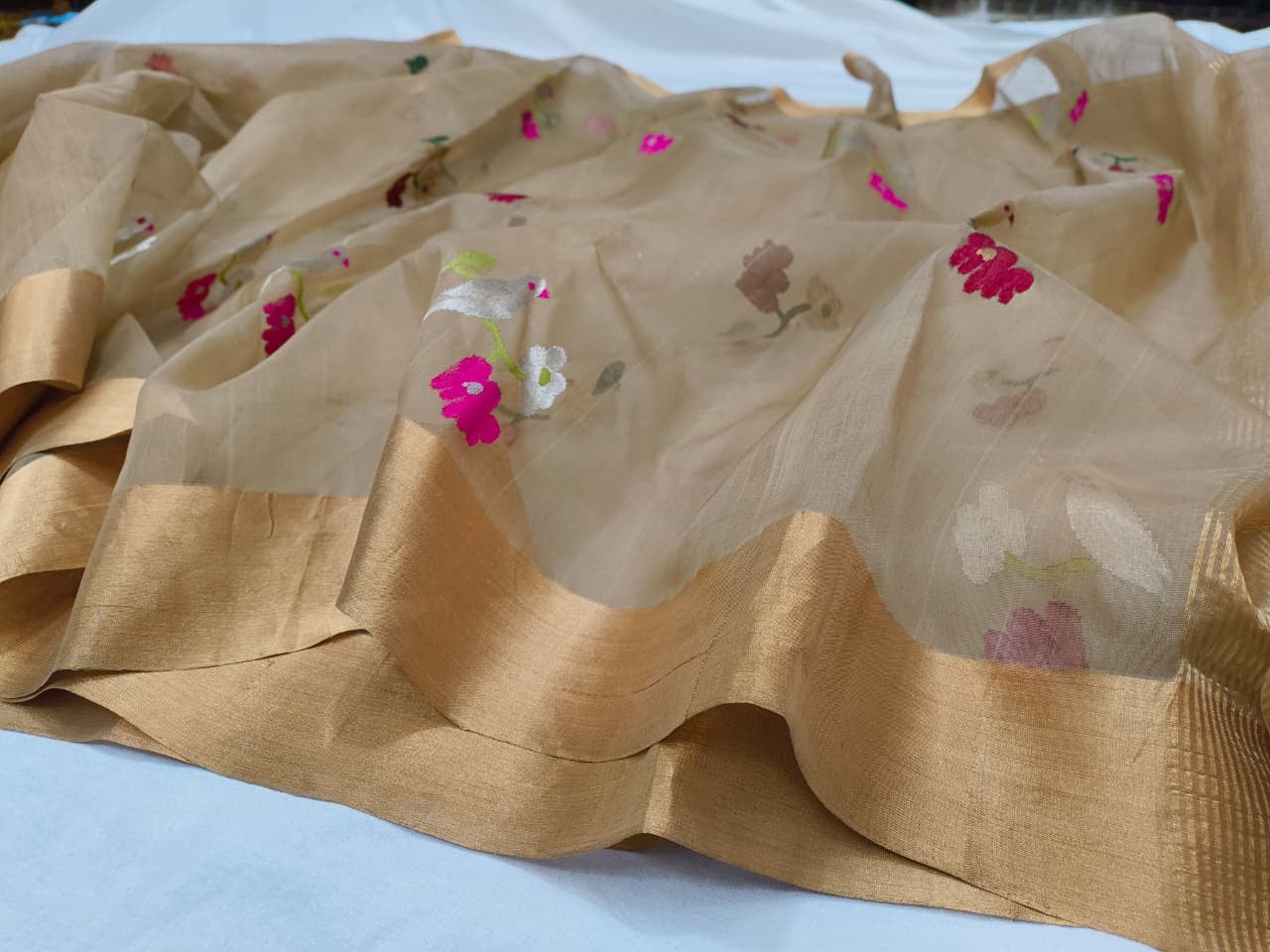 Pure Chanderi Silk Saree
Floral & Bird Embroidery on Sheer Gold-Beige
Tissue Zari Border • Lightweight • Elegant Drape