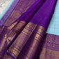 Aqua Amethyst zari kattam Pure Kanchipuram Silk Saree with blue Checks & Purple Border
Radiant sky-blue silk woven with delicate golden checks.
Grand purple korvai borders with elephant and floral motifs.

Silk Mark Certified, delivery in 2 weeks
