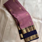 Midnight Blue & Mauve — Pure Silk Kanchipuram

Mauve body with pin-stripes & zari coin buttas ✨

Midnight-navy korvai borders with gaja panels 🌸

Grand navy brocade pallu with tassels 🪔

Silk Mark Certified • Free Shipping USA • Ships in Two Weeks ✅
