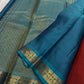 Komethagam Rama ✨
Pure Kanchipuram Silk Saree in Ember Red & Rāmar Blue
Ember-red body with gold zari buttas – gemstone inspired
Contrast Rāmar-blue border with chakra & vine motifs

Silk Mark Certified, delivery in 2 weeks