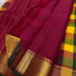Wine pallu detail with zari woven stripes and broad gold zari border with green contrast edge
