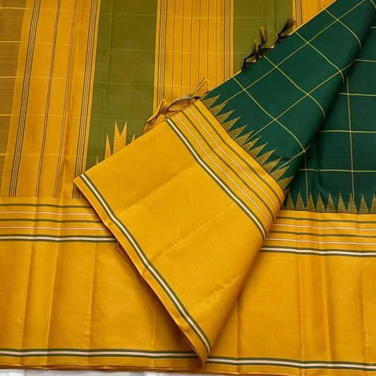 Vasantha Oli Kattam — Pure Silk Kanchipuram
Radiant mustard-yellow body with parrot-green kattam checks 🌿
Temple korvai borders & raspberry-pink contrast pallu ✨
Lightweight festive handloom weave with gold zari accents 💫
Silk Mark Certified • Free Ship