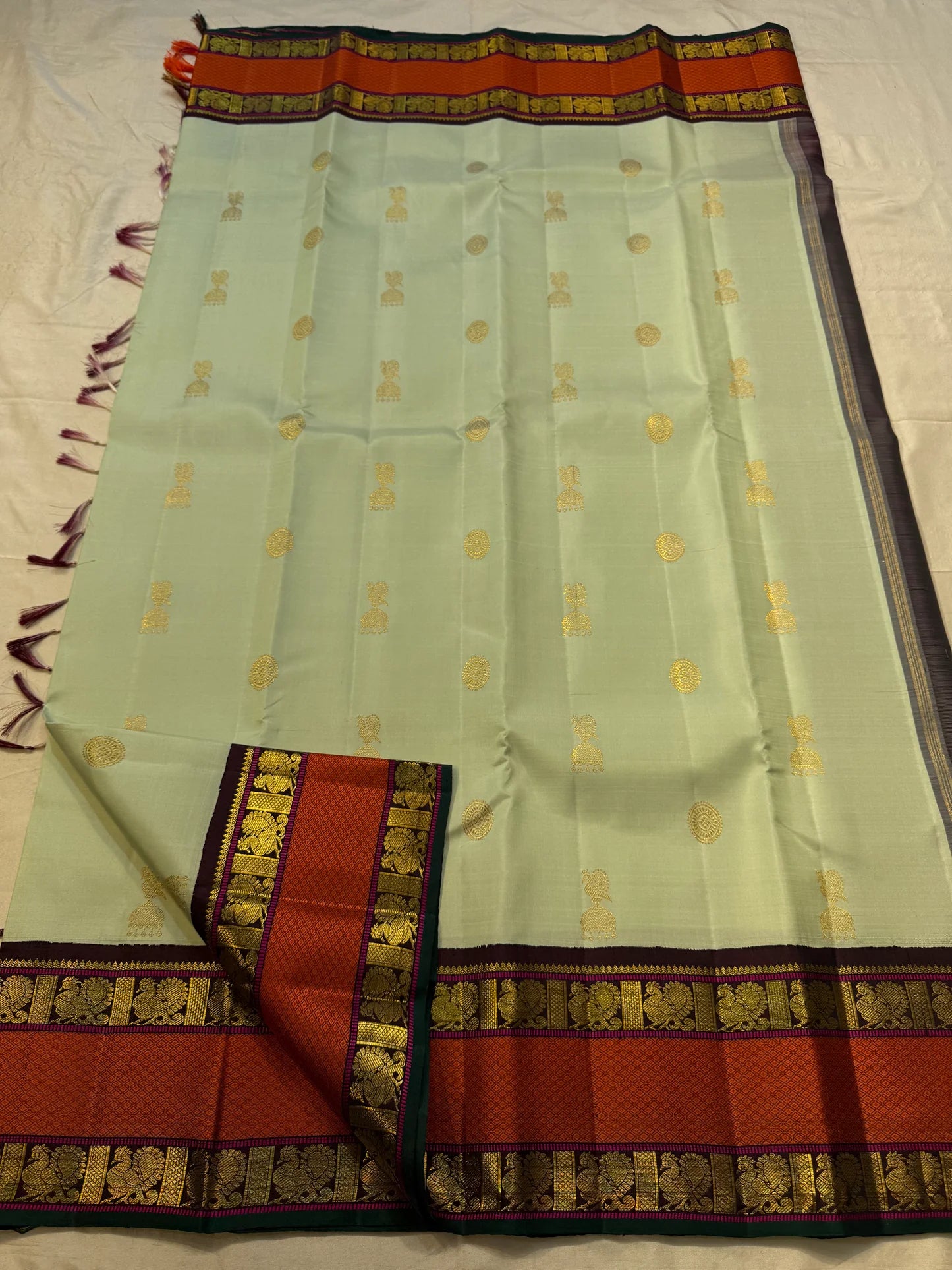 Pure Kanjivaram Silk Saree • Rettapet Yaanai Border • Pistachio Green with Rust Orange