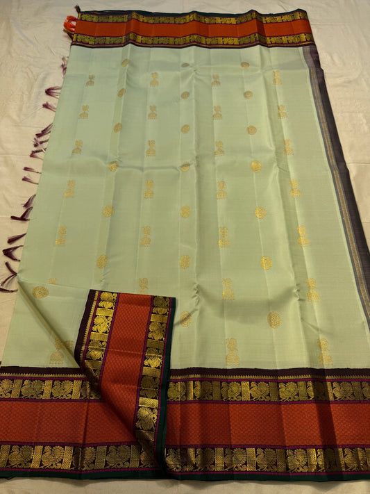 Pure Kanjivaram Silk Saree • Rettapet Yaanai Border • Pistachio Green with Rust Orange