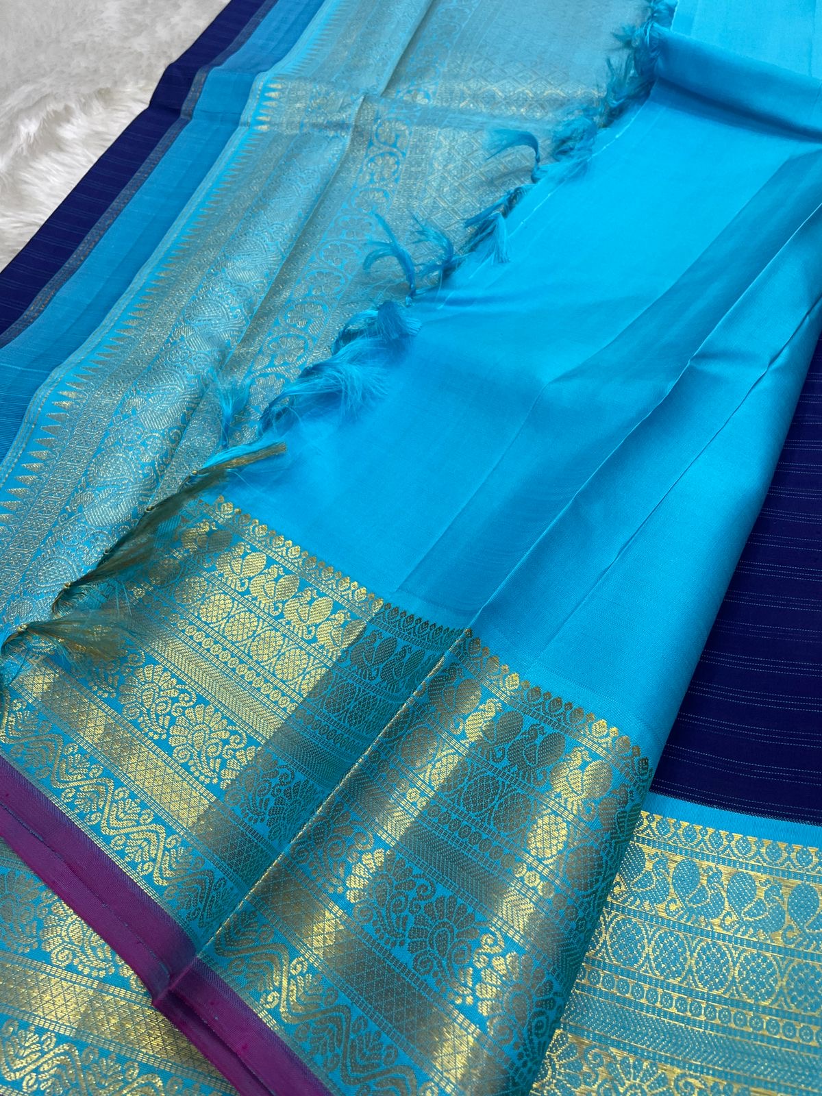 Ramya – Royal Blue Kanchipuram Pure Silk Saree with Zari Peacock Buttas, Sky Blue Varisaipet Border & Pastel Blue Pallu”