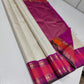 Pearl Lattice – Pure Kanchipuram Silk Saree
Ivory Cream Body with Micro-Checks ✨
Rani-Pink Rettapet Border with Gold Zari
Grand Rani-Pink Brocade Pallu with Traditional Motifs

Silk Mark Certified, delivery in 2 weeks