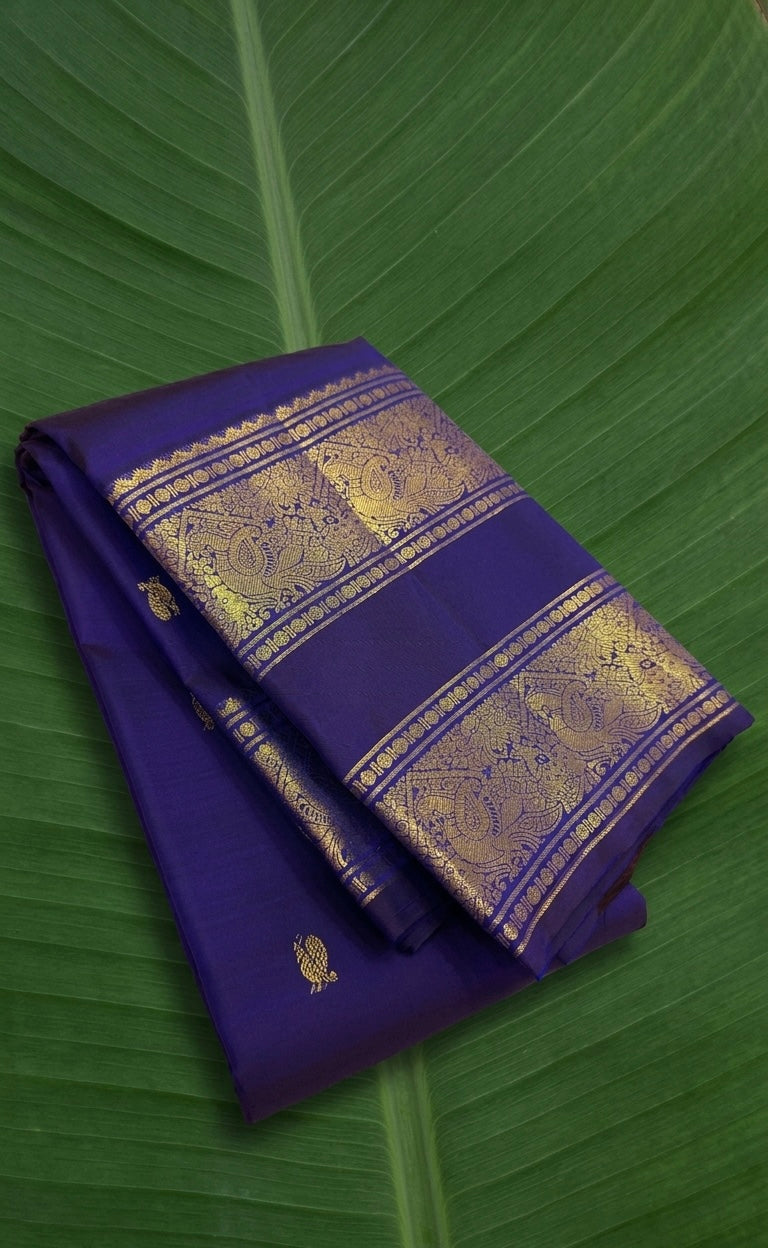 Royal Indigo and Antique Gold Handwoven Pure Silk Kanjeevaram Saree with Rettapet Border and Mayil Chakram Butta