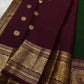 Pachai Butta – Pure Kanchipuram Silk Saree
Emerald silk scattered with radiant buttas.
A wine korvai border rich in gaja artistry.
Floral medallions glow in antique-gold zari.

Silk Mark Certified, delivery in 2 weeks