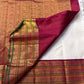 Shveta Chakram — Ivory Kanchipuram Pure Silk 🤍

Contrast maroon brocade pallu & temple border ✨

Chakra medallions, floral vines + green selvedge 🌿

Orange pin-stripes on the border; tasselled finish 🪔

Silk Mark Certified • free shipping with Usa with