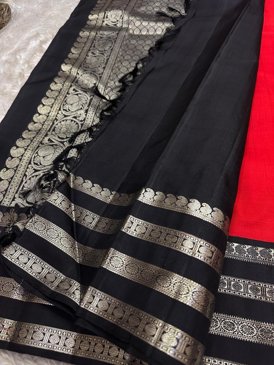 Kohl & Crimson Silk — Pure Kanchipuram Saree
Crimson body with kohl-black silver-zari borders & grand silver pallu
Silk Mark Certified • Free Shipping within USA • Ships in Two Weeks