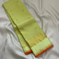 Meadow Shine — Kanchipuram Pure Silk Saree

Pastel meadow-green body with micro kattam checks & zari buttas

Antique zari borders woven with vine & elephant motifs

Warm kesari-orange selvedge a radiant edge . Silk mark cert￼. Free shipping within USA