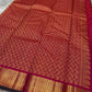 Rani Kili Butta Vairaoosi — Pure Silk Kanchipuram Saree
Rani-pink body with zari buttas & twin parrot motifs, antique-gold coin borders with emerald selvedge
Rich red-orange vairaoosi pallu with rosette brocade, matching blouse included
Silk Mark Cert