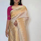 Ivory Glow ✨ – Soft Banarasi Silk Saree
Elegant Ivory Body with Lustrous Sheen
Gold Zari Lightning Border for Festive Radiance
Onam Special Edition – Traditional & Timeless
Silk Mark Certified | Free USA Shipping | Ready to Ship