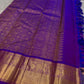 Leelavati Kattam
Amethyst Purple Kanchipuram Silk Saree
Zari-Woven Checks with Elephant Procession Border