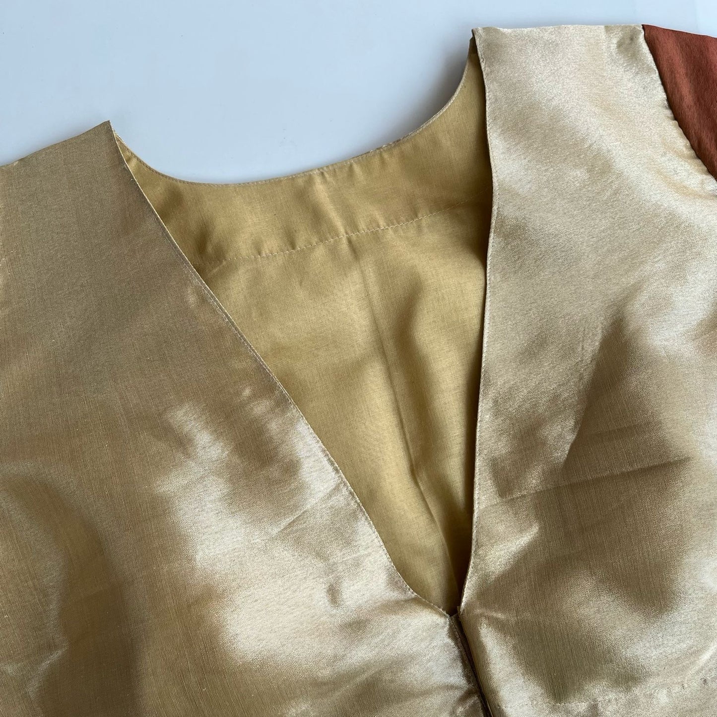 “Riva” Pure tissue silk blouse - gold with copper sleeves