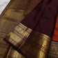 Rust Annam Butta — Kanchipuram Pure Silk

Rust-orange (semman/rust) body with zari chakram buttas

Deep maroon korvai borders with annam (swan) vine motifs

Lavish maroon-gold zari pallu with temple serrations

Silk Mark Certified | Free Shipping