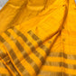 Kanaka – Sunlit Mustard Kanchipuram Silk Saree with Checked Zari Buttas and Gold Striped Border
A radiant weave that captures the warmth of tradition and the glow of celebration