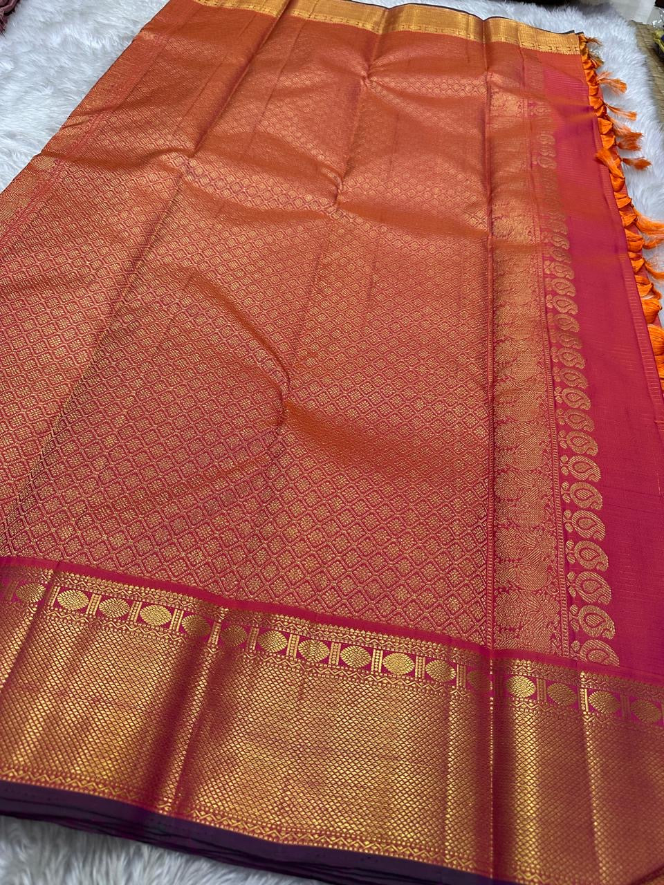 Tejas – Radiant Pink & Flaming Orange shot color Kanchipuram Silk Saree with Zari Kattam, Kamalam Buttas & Intricate Arai Maadam Pallu, Woven from an Exquisite Blend of colors