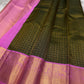 Iniya – Bottle Green & Pink Kanchipuram Pure Silk Saree with Floral Jaal and Mayil Border
Graceful and refreshing, Iniya is a handwoven masterpiece in bottle green with soft pastel pink accents. Delicate floral jaal and mayil motifs dance across the drape