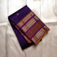 Swarna Laya — Pure Silk Kanchipuram Saree
Deep vaadamalli purple with gold zari buttas, antique-gold border, and rich striped pallu.
Silk Mark Certified • Free USA Shipping • Ships in Two Weeks.