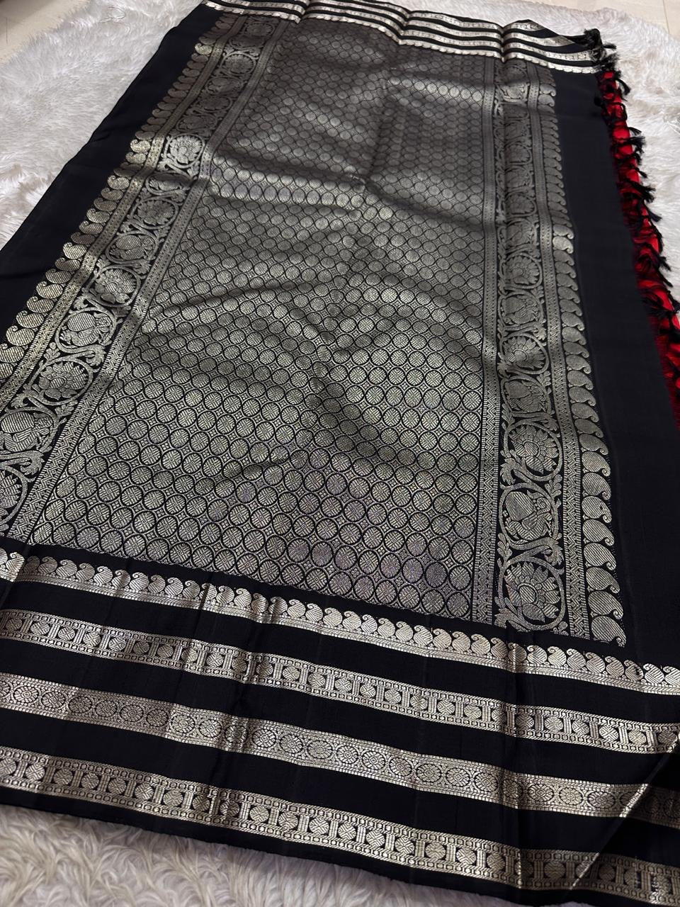 Kohl & Crimson Silk — Pure Kanchipuram Saree
Crimson body with kohl-black silver-zari borders & grand silver pallu
Silk Mark Certified • Free Shipping within USA • Ships in Two Weeks