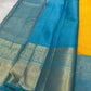 This radiant yellow pure silk drape is elevated by an exquisite and unexpected pairing — a serene sky blue border, making it both eye-catching and rare. Fine zari checks shimmer gently across the body, timeless bavaanji border