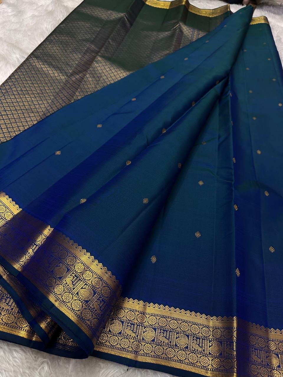Indira – Peacock Blue-Green Kanchipuram Pure Silk Saree with Zari Butta & muthu seer and rudraksham Pettu  Border
