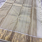 Pearl Radiance ✨ – Pure Kanchipuram Silk Saree
Ivory Body with Gold Zari Buttas & Medallions
Traditional Yali & Peacock Motif Zari Border
Grand Zari Pallu with Paisleys & Floral Vines
Silk Mark Certified | Free USA Shipping