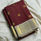 Malar – Earthy Brown Vairaoosi Silk Saree with Kamalam & Chakram Buttas

Accented with a Finely Woven Muthu Seer Zari Border in Gold
Elegant Zari Pallu with Paisley and Chakram Motifs in a Rich Grid Layout
Paired with a Soft Cr