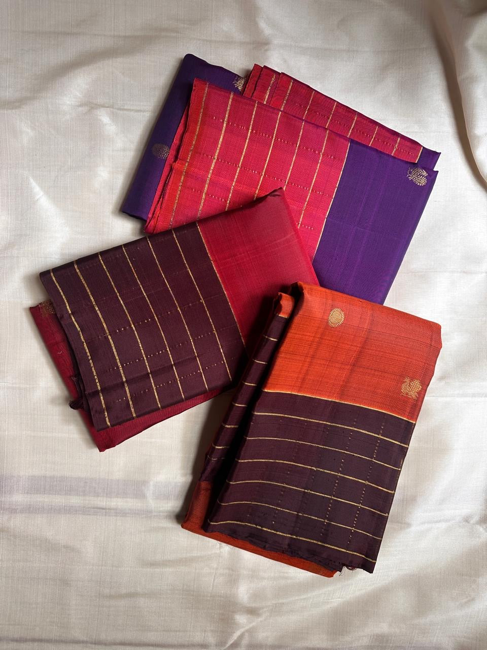 Poornima Kalyani
Kungumam Red & Cocoa Kanchipuram Silk Saree
Zari Buttas · Grid Borders · Silk Mark Certified