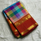 Ratna Mala ✨ – Pure Kanchipuram Silk Saree
Multicolor Checked Body in Vibrant Jewel Tones
Deep Red Korvai Border with Gold Zari Weaving
Grand Red Zari Brocade Pallu with Traditional Motifs
A Regal Handwoven Drape – Perfect for Weddings & Festive Wear!