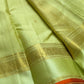 Meadow Shine — Kanchipuram Pure Silk Saree

Pastel meadow-green body with micro kattam checks & zari buttas

Antique zari borders woven with vine & elephant motifs

Warm kesari-orange selvedge a radiant edge . Silk mark cert￼. Free shipping within USA