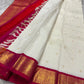 Banu – Off-White Kanchipuram Pure Silk Saree with pure 3gm Zari Kattam & Deep Red-Pink Shot color Border with elegant and peacock motifs