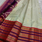 Pure silk kanchipuram grey with sampanga green vairaoosi with detailed ornate varisaipet border thandavalam zari , mayil Butta