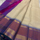 Vaidhehi – Ivory Kanchipuram Silk Saree
A classic ivory silk saree with a shot purple-orange Rudraksham border and a rich Thazhampoo reku pallu—timeless elegance woven with tradition