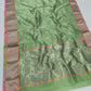 Anaya – Earthy Green Silk Chanderi Saree with Pink Contrast Border & Full Zari Pallu
A refreshing earthy green Silk Chanderi saree that drapes like a dream.
Adorned with fine gold and silver zari work across the body.
