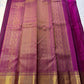 Plum & Magenta Round Butta – Pure Kanchipuram Silk Saree
Deep plum body with bold round gold zari buttas
Contrast green selvedge & gold tissue borders with magenta detailing
Grand magenta-pink pallu with full zari diamond jaal & geometric panels
Silk Mark