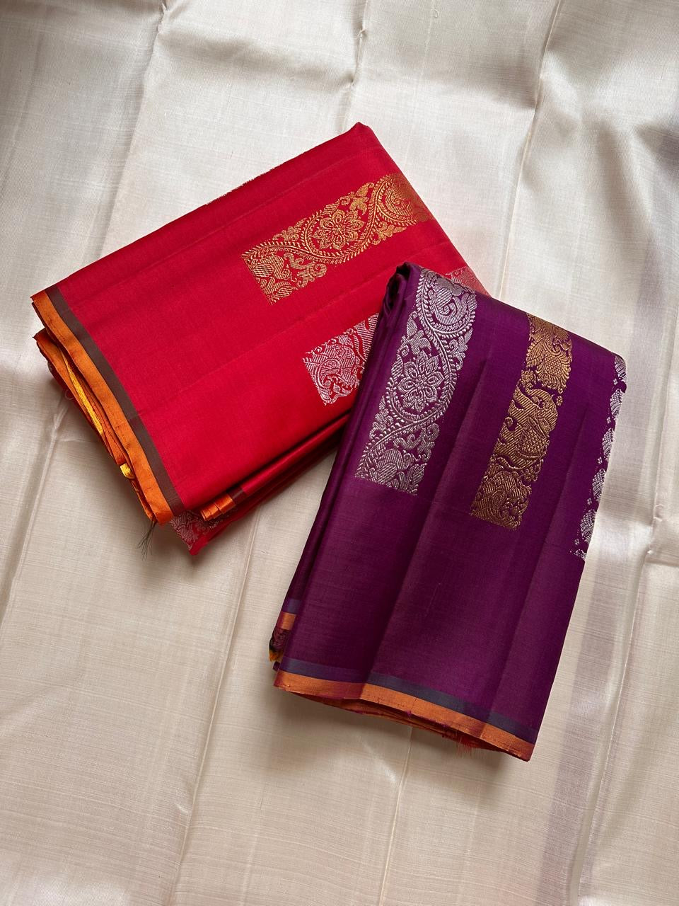 Lavanya– Vermillion Red Handwoven Kanchipuram Silk Saree in red with Gold & Silver Zari, this deep red Kanchipuram silk saree with intricate motifs in gold and silver zari, including Gandaberunda, parrots, elephants &lotuses as seen on Nita Ambani