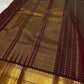 Ruby Zari Kattam – Pure Kanchipuram Silk Saree
Rich Ruby Red Body with Gold Zari Checks
Broad Golden Border with Maroon Highlights & Temple Motifs
Dual-Toned Maroon-Green Pallu with Intricate Zari Weaves

Silk Mark Certified, delivery in 2 weeks