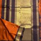 Rust Orange Annam Bloom – Pure Silk Kanchipuram
Rust-orange body with delicate zari buttas 🌸
Aubergine korvai borders with majestic Annam motifs 🪔
Grand aubergine pallu with kasu stripes & tissue weave ✨
Silk Mark Cert • Ships in Two Weeks- chk desc