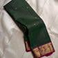 Hemavalli Zari Kattam: Stunning Emerald Green & Rani Pink Korvai Pure Silk Kanchipuram with Gold Zari Checks
Silk Mark Certified for Quality Assurance, Enjoy Free Shipping within USA.
Ready to Ship in 2 Weeks with Majestic Peacock Borders.