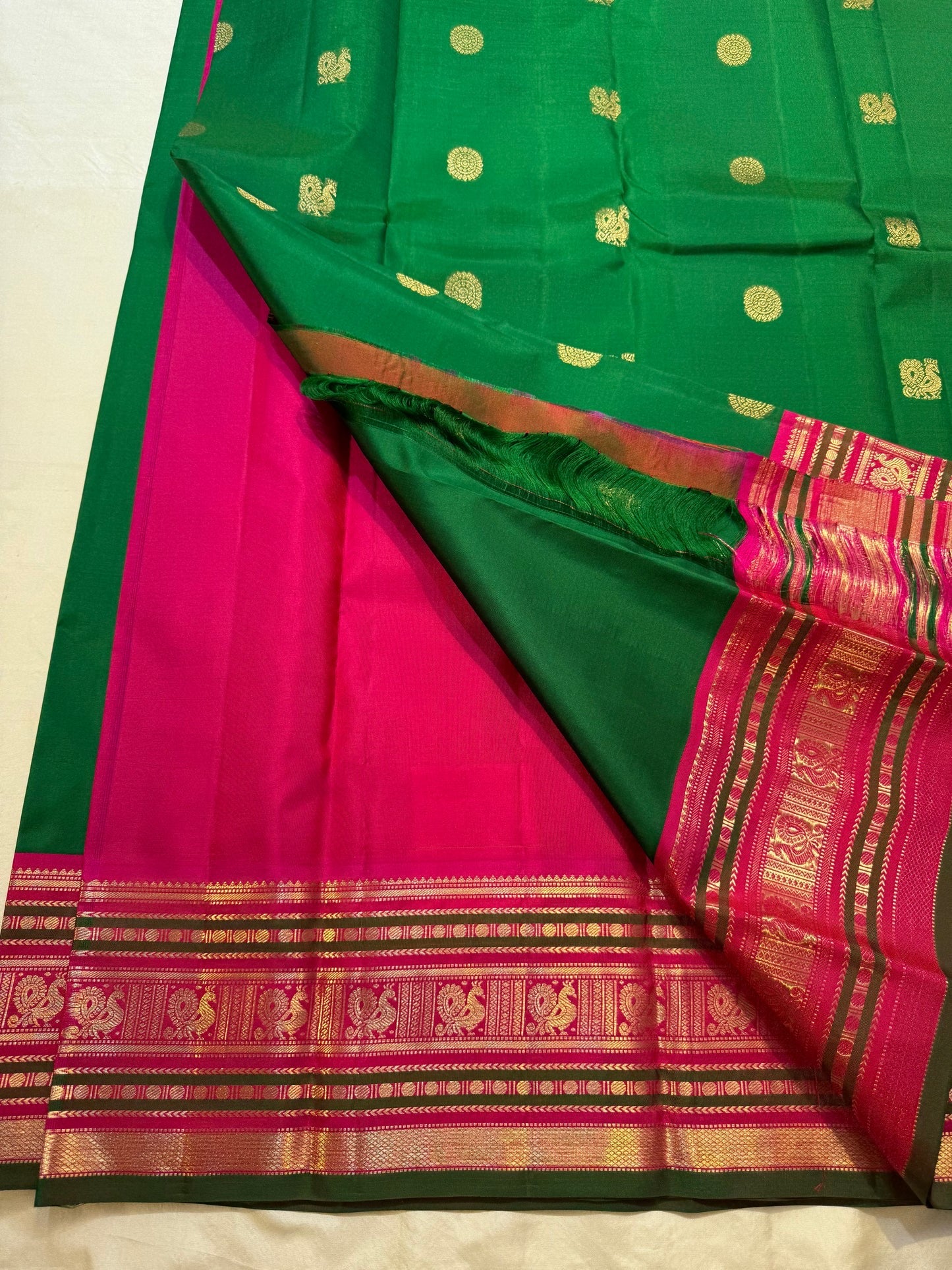 Magenta Kanchipuram pallu with full-breadth woven bird and geometric motifs in gold zari bands — full spread