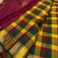 Paalum Pazhamum kattam checks close-up with wine pallu and broad gold zari border