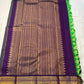 Arangetram — Parrot-Green Kanchipuram Pure Silk
Royal Purple Korvai Border 

Elephant Procession Panels & Coin Buttas

Rich Brocade Pallu • Blouse Included

Silk Mark Certified • Free USA Shipping • Ships in Two Weeks
