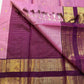 Rose Mist Zari Kattam — Kanchipuram Pure Silk

Blush rose-pink body with micro kattam (checks) in zari & scattered soorya-chakram buttas

Contrast mulberry purple korvai borders with rich gold zari detailing

Free shipping within USA silk mark certified