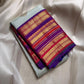 Kumari ✨ – Pastel Sage Green Kanchipuram Pure Silk Saree
with Delicate Golden Floral Buttas 🌸
Purple–Red Korvai Varisaipet Zari Border
Grand Purple Pallu with Stripes & Floral Vines
An Heirloom of Grace, Heritage & Festive Splendor