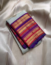 Kumari ✨ – Pastel Sage Green Kanchipuram Pure Silk Saree
with Delicate Golden Floral Buttas 🌸
Purple–Red Korvai Varisaipet Zari Border
Grand Purple Pallu with Stripes & Floral Vines
An Heirloom of Grace, Heritage & Festive Splendor