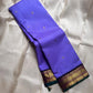 Kili kanchipuram beautiful purple and violet combination adorned with kili and kamalam butta , vanasringaram border and green selvedge with parrots parading   in Pallu