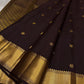 Agnika – Dark Espresso Kanchipuram Silk Saree with Mayil Chakram Butta
Fiery and regal, Agnika features a rich dark espresso silk body with intricate Mayil Chakram (peacock) motifs and a shimmering zari border—an elegant ode to South Indian tradition.